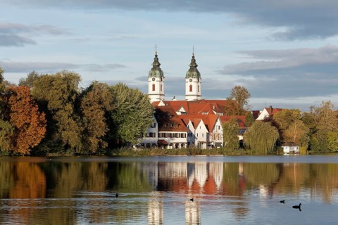 Church of St. Peter, view over the town lake, morning light, autumn, Bad forest lake, Upper Swabia,