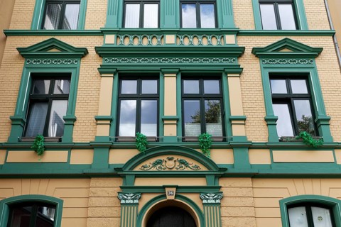 Renovated residential building in Wilhelminian style, decorative façade, old building property,