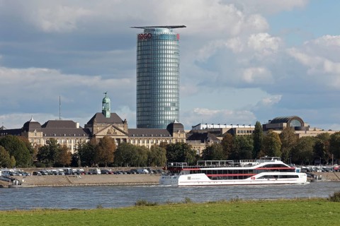 Event ship MS Rheingalaxie sails in front of ERGO tower block and district government, Düsseldorf,