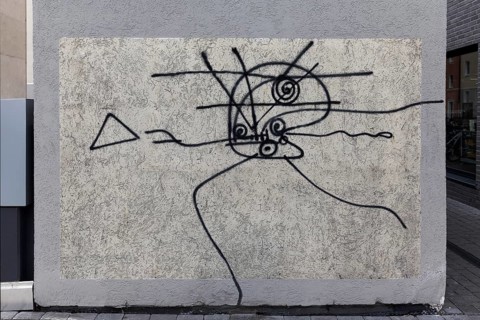 Abstract figure with legs, stick figure, line drawing by street artist Harald Naegeli, sprayer from