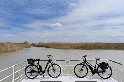 Bicycles on bicycle ferry in the canal, Illmitz, Lake Neusiedl National Park, Seewinkel,