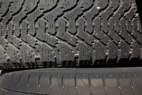Close-up of threads on black rubber truck tires, Quebec, Canada, North America
