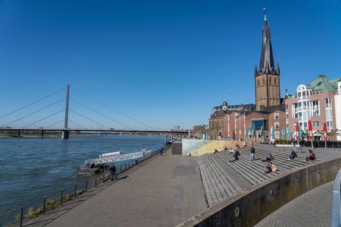 Empty Rhine embankment promenade, consequences of the contact ban, effects of the coronavirus