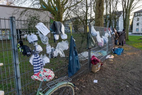 Gift fence with donations for the homeless and needy, food, hygiene articles, clothing, in Essen