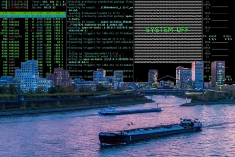Symbolic image cyberattack, computer crime, cybercrime, computer hackers attack a city's IT