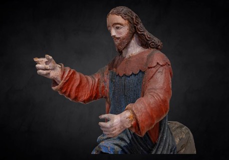 Christ on the palm donkey, on a dark background, detail, wooden figure from around 1400, Museum