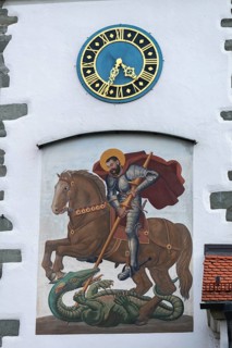 Moated castle, Lake Constance, parish church of St George, church tower clock, church patron saint