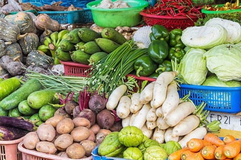 Various fresh fruits and vegetables on the market in Vietnam