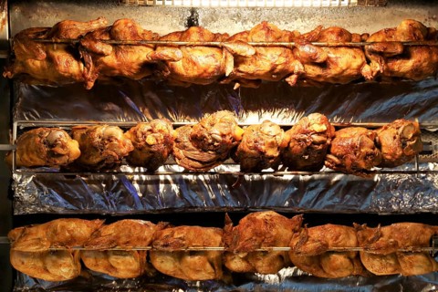 Grilled knuckle of pork and chicken on the spit
