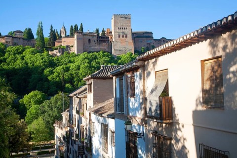 Cuesta de la Victoria street in the Albaicin district, Granada, Spain view over to the Alhambra