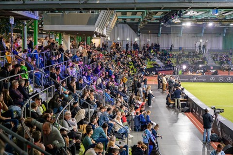 A crowd attentively watches a sporting event in a hall, Mercedes Benz Junior Cup, Glaspalast