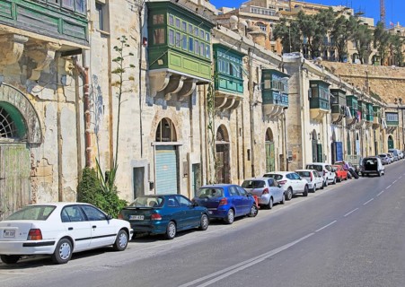 Historic waterfront buildings on Grand Harbour waterside, Valletta, Malta, Europe