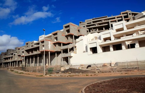 Concrete shells of uncompleted housing in the Castillo development, Caleta de Fuste, Fuerteventura,