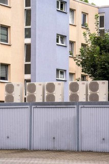 Heat pumps in a residential area, multi-family houses are supplied with heating, cooling and