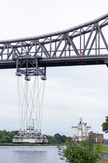 Container ship, cargo ship, high bridge, transporter bridge, Kiel Canal, Rendsburg,
