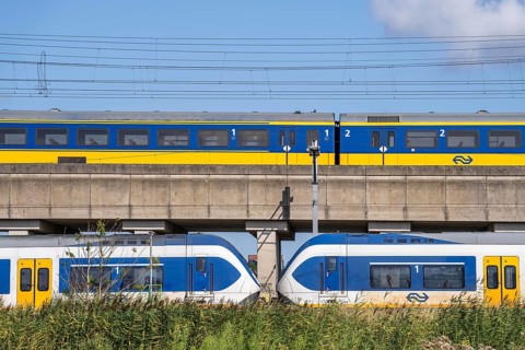 Trains of the Dutch railway, NS, Nederlandse Spoorwegen N.V., on a double-decker track, below local