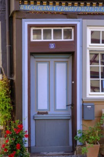 Colourful door, half-timbered, Hannoversch Münden, Hann. Münden, Lower Saxony, Germany, Europe