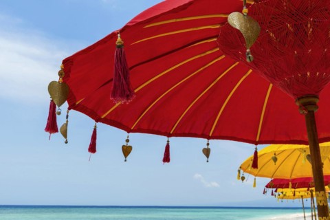 Traditional Balinese temple sunshade as parasol, Hinduism, symbol, beach holiday, protection, sun