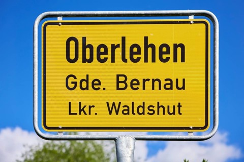 Town entrance sign against blue sky to the Oberlehen district, Bernau im Black Forest, Black