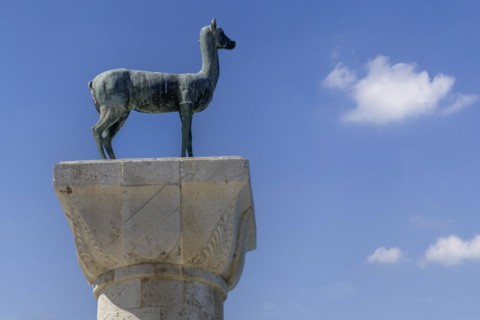 Column with hind, the Elafina, harbour entrance Mandraki harbour, Rhodes, Dodecanese archipelago,