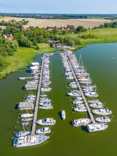 Aerial view, drone photo: Yachts in Krummin natural harbour, Krumminer Wiek on the Peene River,