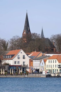 Town view at Lake Malchow with town harbour and town church, Malchow, island town, Mecklenburg Lake
