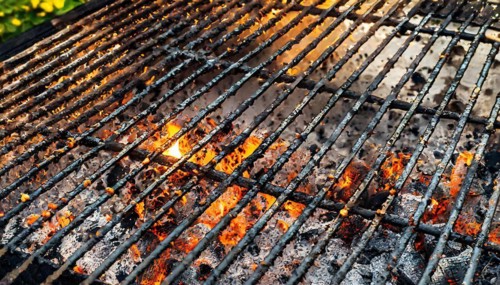 Empty grill grate with burnt remains on the grid, garden grill, AI generated, AI generated