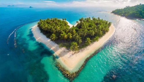 Symbol, small heart-shaped island in the sea, love island, honeymoon, palm beach, aerial view,