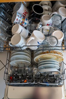 Dishwasher, full of dirty crockery