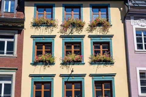 House facade, historic town houses, town houses in detail with decorated windows, in the historic