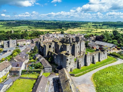Middleham Castle from a drone, Middleham, Wensleydale, North Yorkshire, England, United Kingdom,