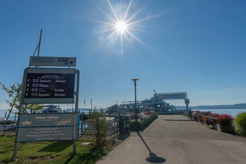 Unteruhldingen, Lake Constance, jetty, display board, lakeside promenade, backlight shot,