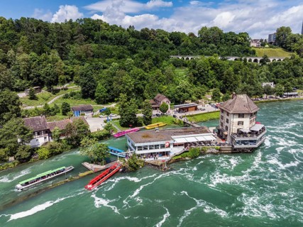 Aerial view of the landing stage, boat harbour and Schlössli Wörth with panorama restaurant below