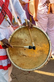 Drum player during a religious festival of Afro-Brazilian culture on the streets of Brazil, Belo