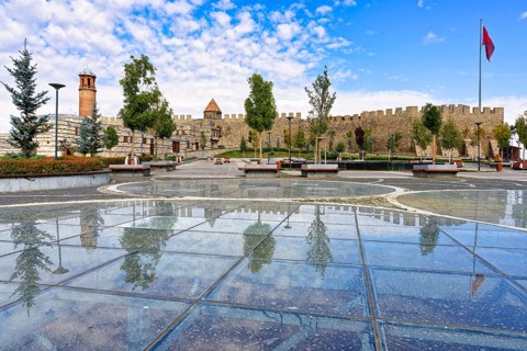 Reflections in the glass grounded Kale city park and Erzurum byzantine castle, Anatolia, Turkey,