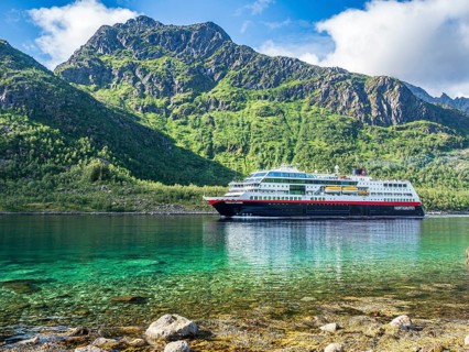Hurtigruten cruise ship passing the Raftsund, the strait between islands Hinnøya and Austvågøya,