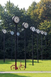 Station clocks with synchronised time, art installation Zeitfeld by Klaus Rinke in the Volksgarten