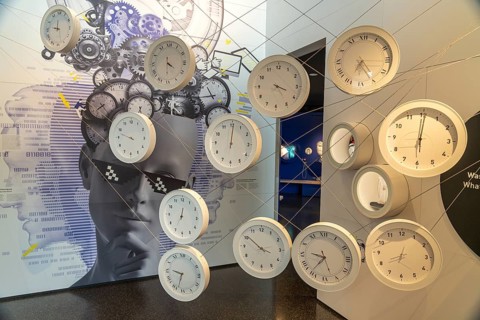 Exhibition with clocks in the interior of the Museum for Future Issues Futurium in Berlin, Germany,