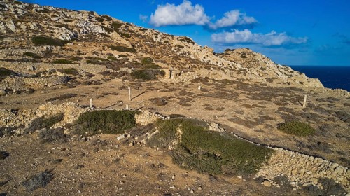 Drone shot, Archaeological site, Rocky landscape with ruins and sea view, Acropolis hill, Ruins of