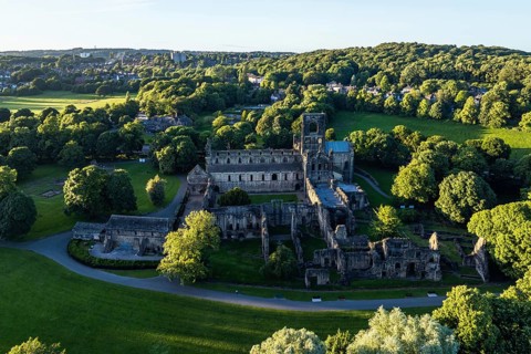Kirkstall Abbey from a drone, Kirkstall, River Aire, Leeds, West Yorkshire, England, United