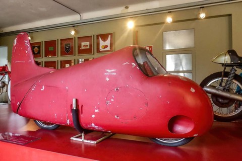 Record vehicle motorbike with red painted streamlined full fairing Model 75 Record from 1950s,