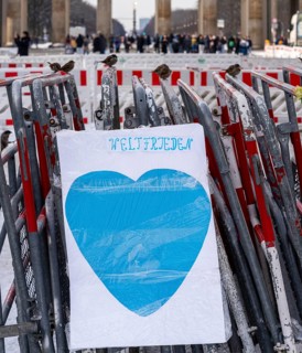 Demonstration, posters and barriers at the Brandenburg Gate, Berlin, Germany, Europe