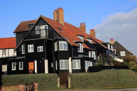 Large black clapboard house at Thorpeness, Suffolk, England, UK