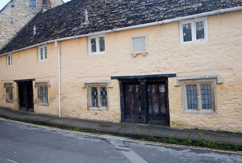 Row of historic almshouses in Kingsbury Street, Calne north Wiltshire, England erected by Dr John