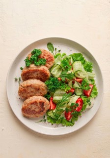 Fried cutlets, turkey, with vegetable salad, top view, no people