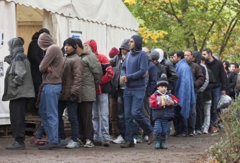 Refugees from Syria waiting to be registered at the Central Reception Centre for Asylum Seekers at