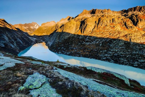 Sunrise in the Swiss Alps with Grimselsee and Lauteraarhorn in the canton of Bern, Switzerland,