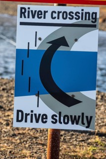 Warning notice at a ford, river crossing on mountain road F206, road to Laki crater or Lakagígar,