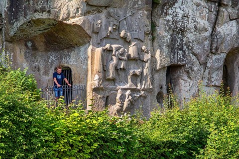 Cross relief at the Externsteine, sandstone rock formation. Horn-Bad Meinberg, Teutoburg Forest,