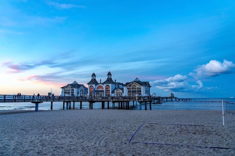 The pier of Sellin, evening mood, sunset, 394 metres long, with restaurant, jetty, beach chairs,